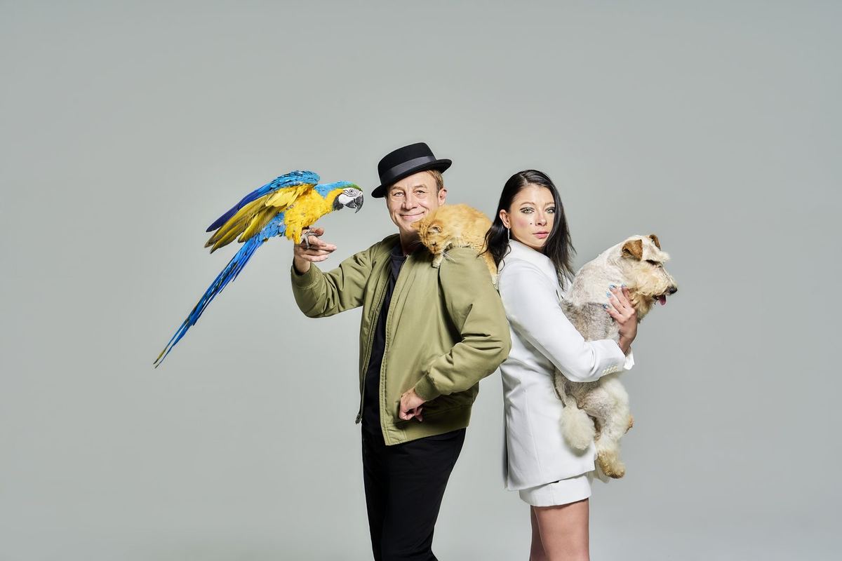 Gregory and Anastasia with parrot, cat and terrier